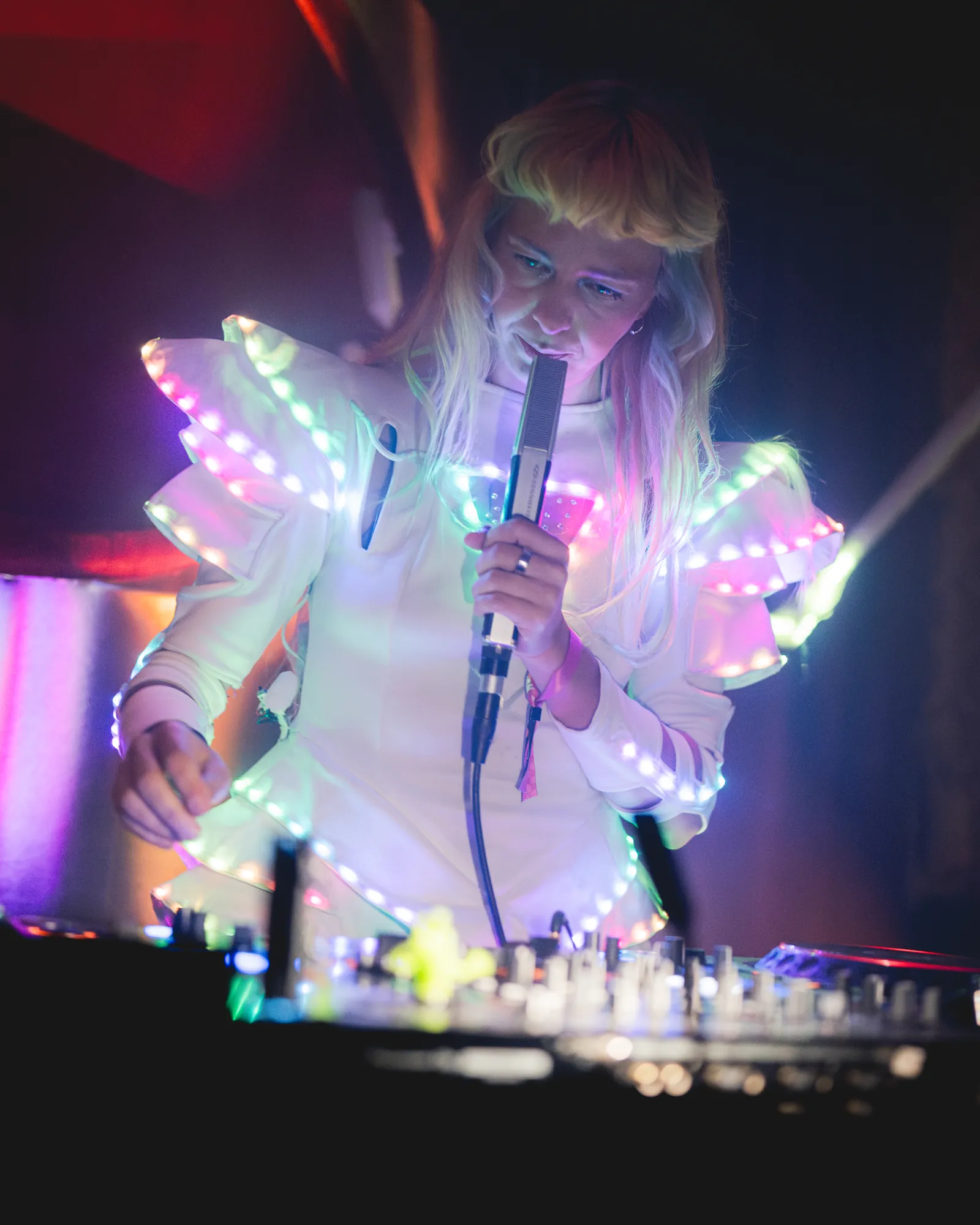 Performer lit by colorful LEDs